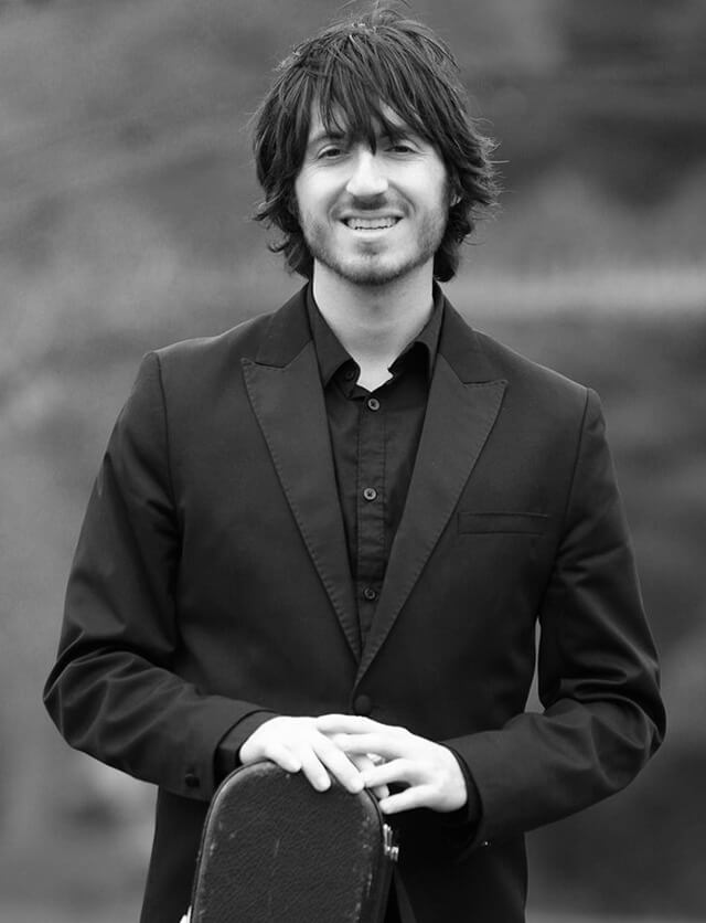 Francesco Barone smiles outside