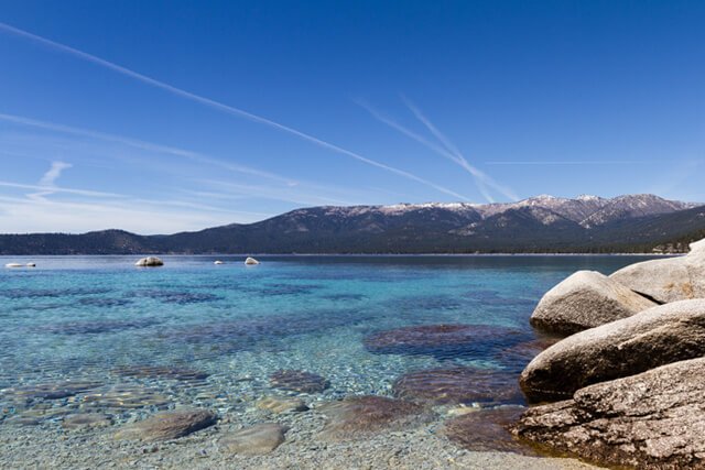 Chemtrails streak the Lake Tahoe sky
