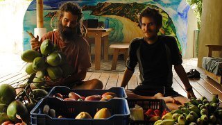 Mads and Mikkel Gisle Johnsen with an abundant supply of fruits