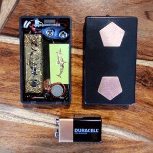 T-Rx Zapper beside a battery