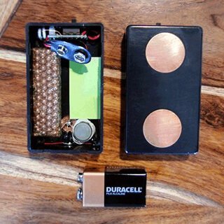 Terminator Zapper beside a battery