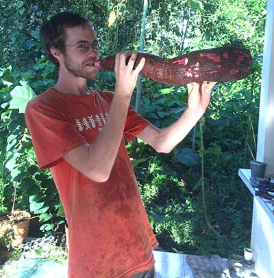 Peter Csere holds a yuca