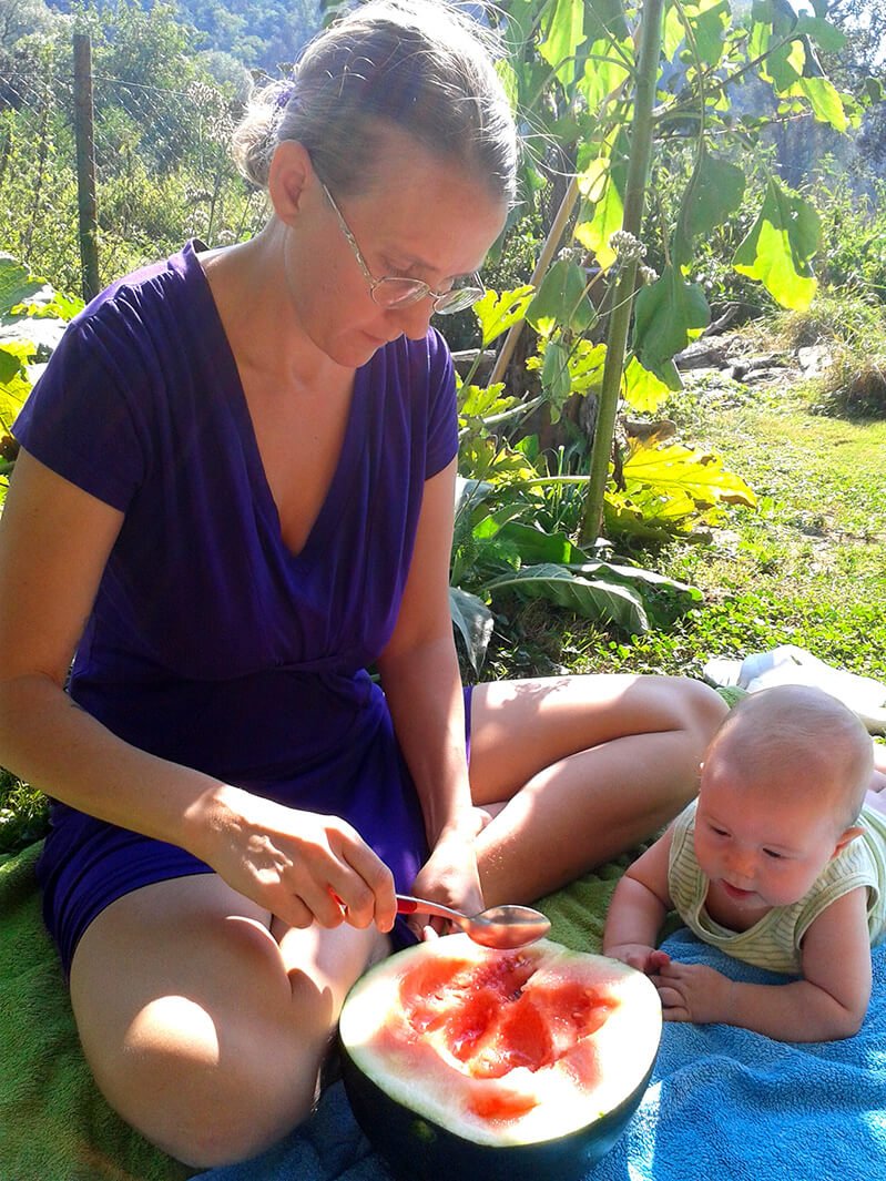 Alexandra Cech eating a watermelon with her and Petr Cech's baby