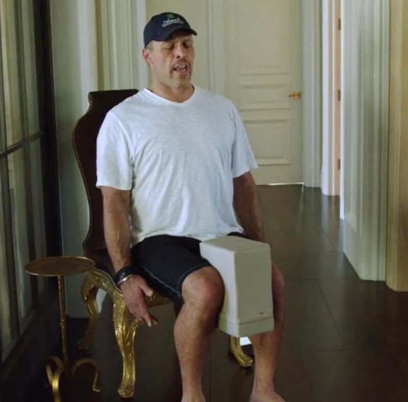 Tony Robbins practicing an Egoscue Method E-cise