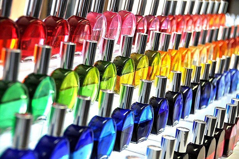 Closeup photograph of colored oils and essences