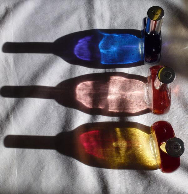 A trio of Color Mirrors and their strongly cast shadows