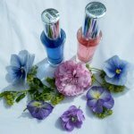 The Color Mirrors Starlight Magic and Starlight Innocence with flowers on white background