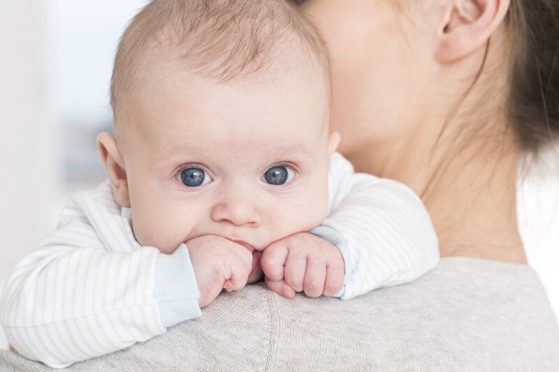 Essential oils can be used on babies such as this baby, being held by its mother