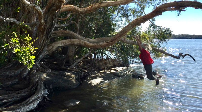 Ping Chan swings from a rope