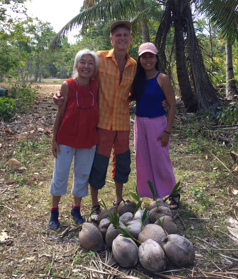 Ping Chan is photographed with Robert Lockhart and wife Ree Anna