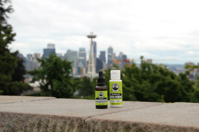 Uncle Harry's Natural Products for oral hygiene photographed with Seattle's Space Needle in the background