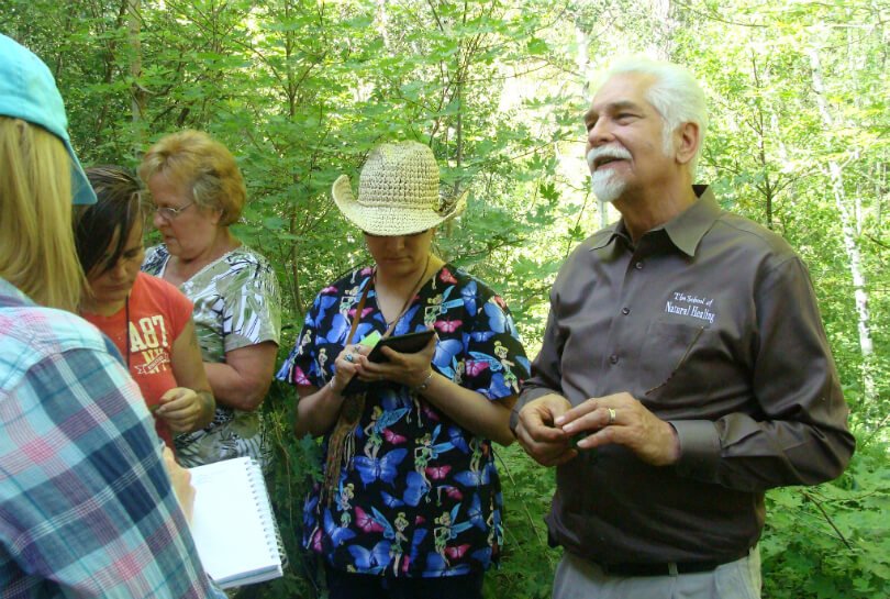 David Christopher educates about herbs and health outside