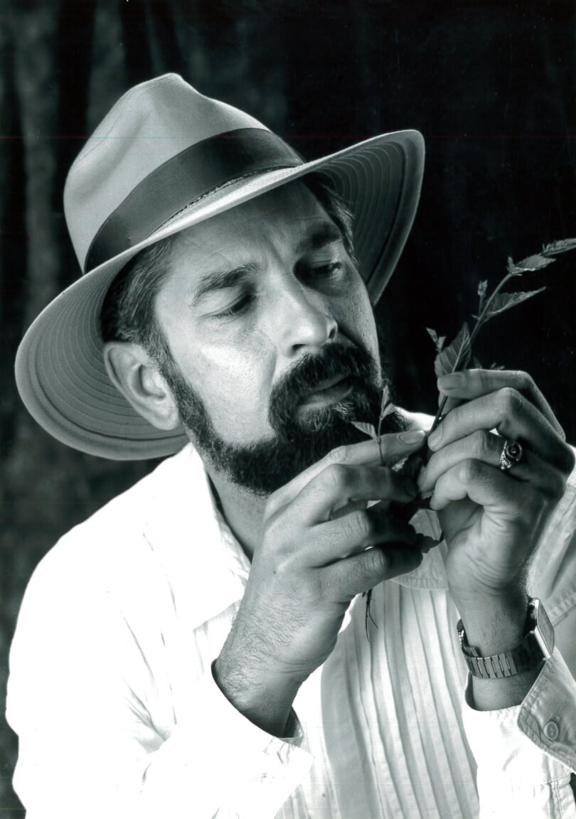 David Christopher inspects healing herbs for health
