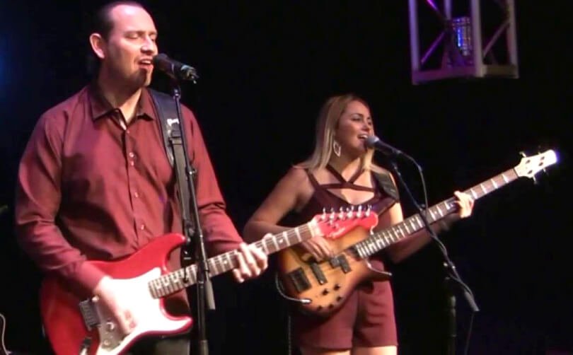 Charley Hinchcliffe and Jesi DiPalo playing guitar and bass - Fruit-Powered