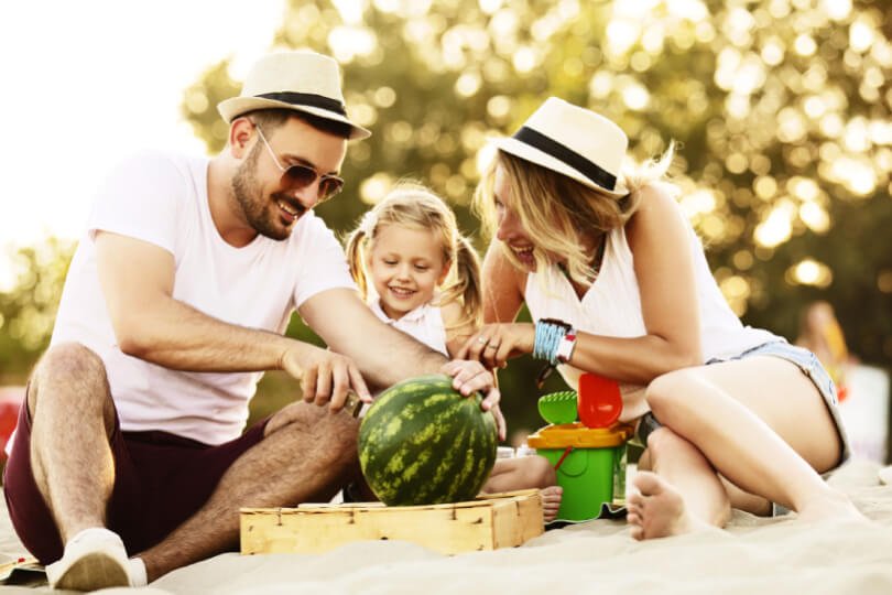 Father, mother and child with watermelon - Fruit-Powered