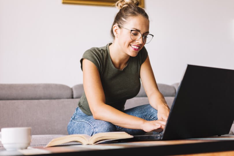 Proper sitting posture - woman hunched over laptop - Posture Exercises Method - Fruit-Powered