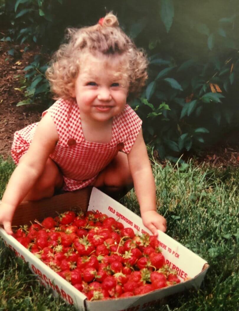 Caileigh Feldman - chronic eczema - topical steroid withdrawal - 2 years old - with box of strawberries - Fruit-Powered