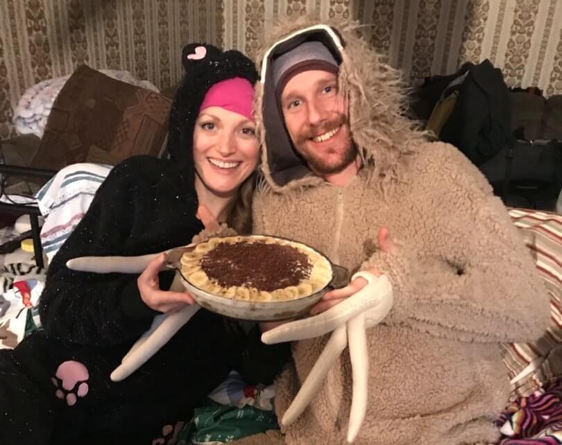 Chris Kendall and Kamilla Jonvik holding food and wearing animal onesies - Fruit-Powered