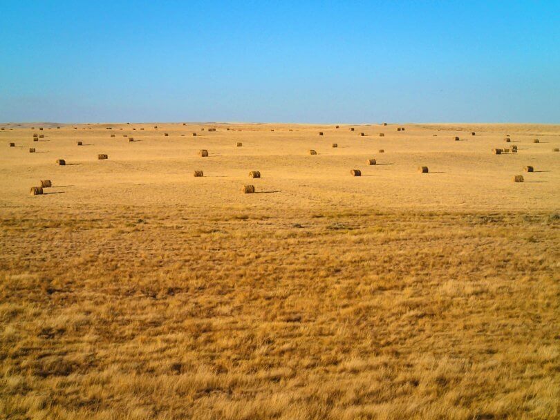 Ken Ilgunas - Montana hay field - vandwelling - wanderlust - society - Fruit-Powered