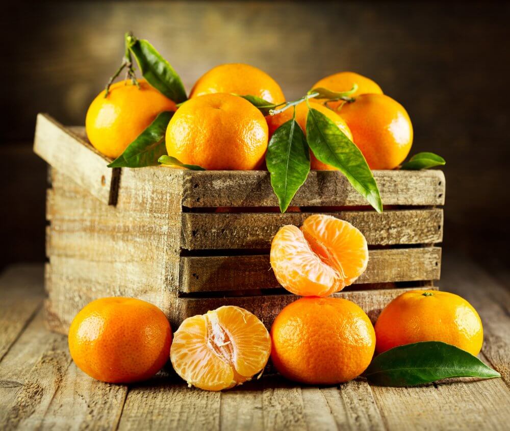 Importance of eating organic fruit - basket of oranges - Fruit-Powered