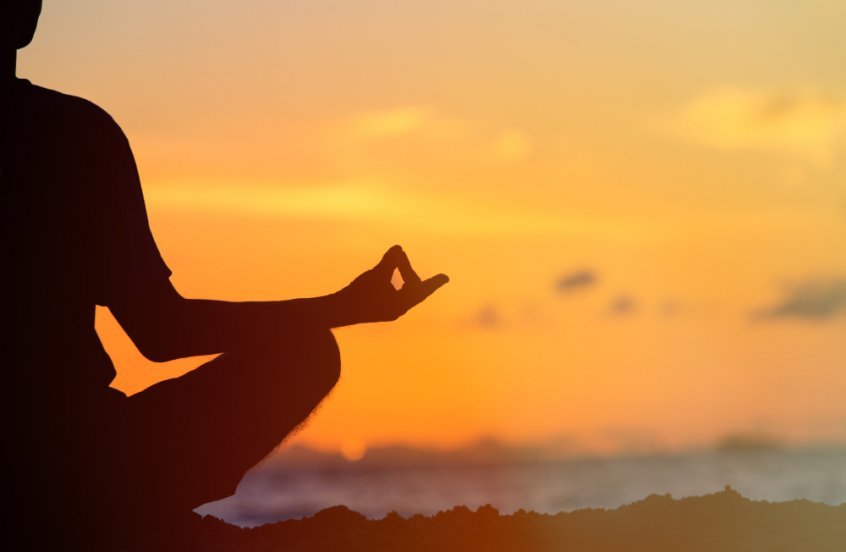 Fruitarianism - spiritual connection - intuitive clarity - person meditating - Fruit-Powered