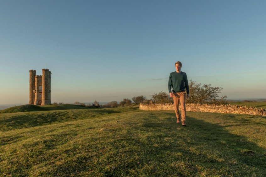 Raw Vegan Tips for creating a life you love - Jack Childs - walking with castle in background - Fruit-Powered