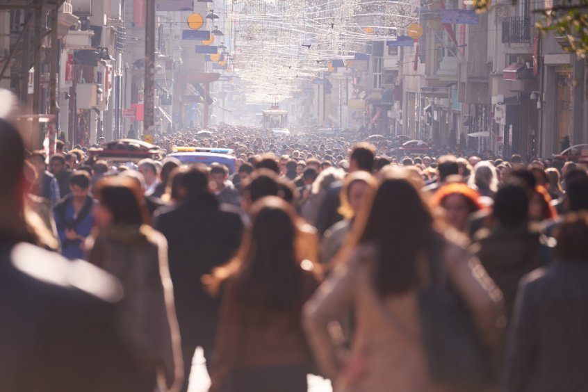 Make every day Earth Day to save the planet - crowd of people in busy city - Fruit-Powered